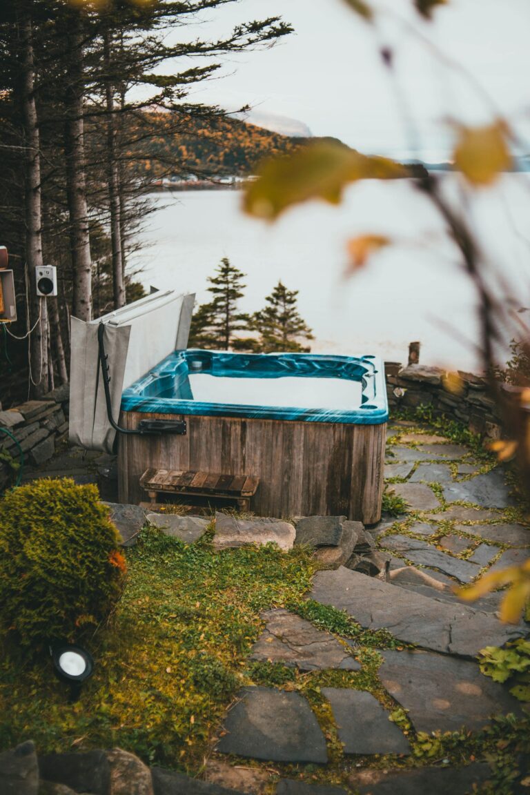 Hot tub in a serene wilderness setting for relaxation and healing during cancer treatment.