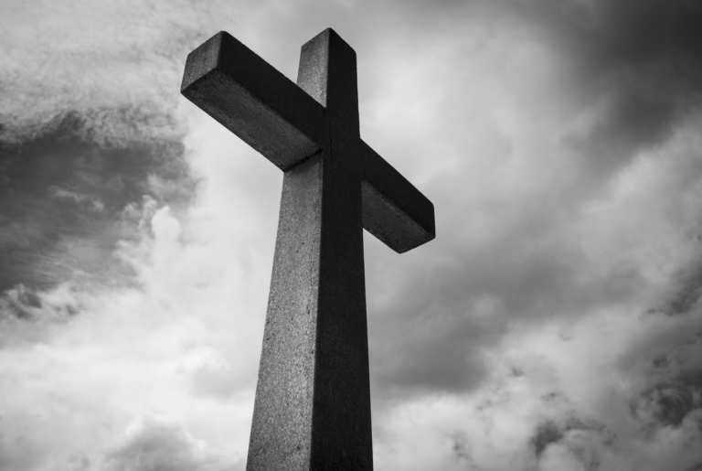 Cross on a hill symbolizing faith in God during challenging times such as cancer and healing.