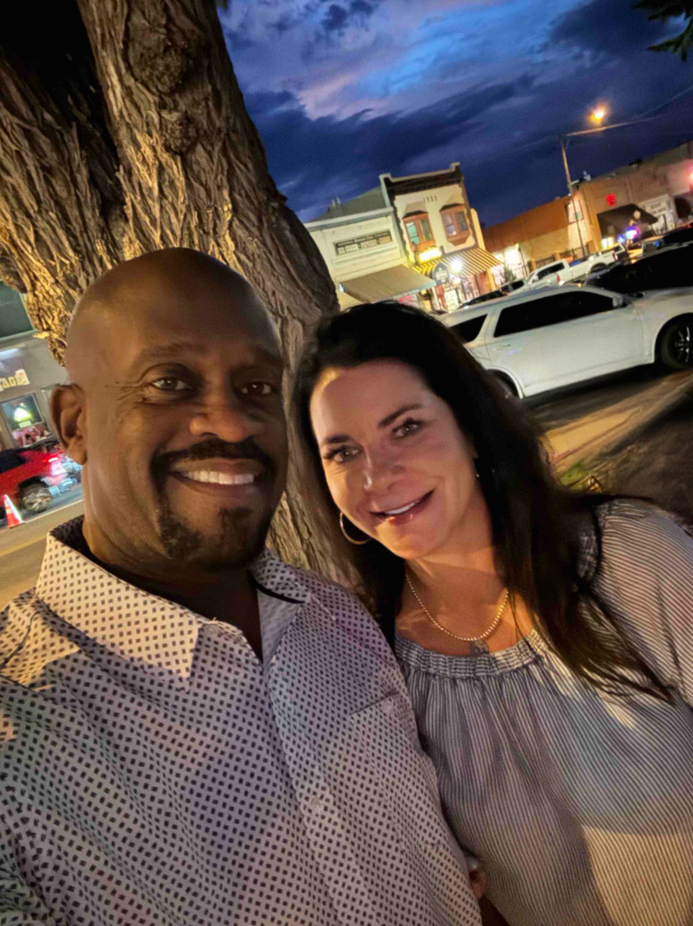 couple smiling together before cancer diagnosis, capturing a meaningful relationship