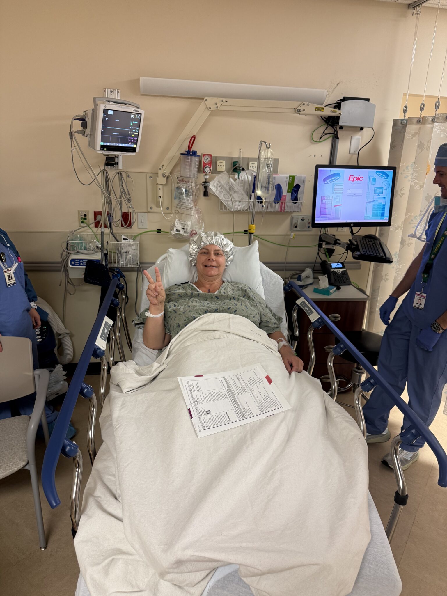 Preparing for breast cancer surgery in hospital bed before double mastectomy.