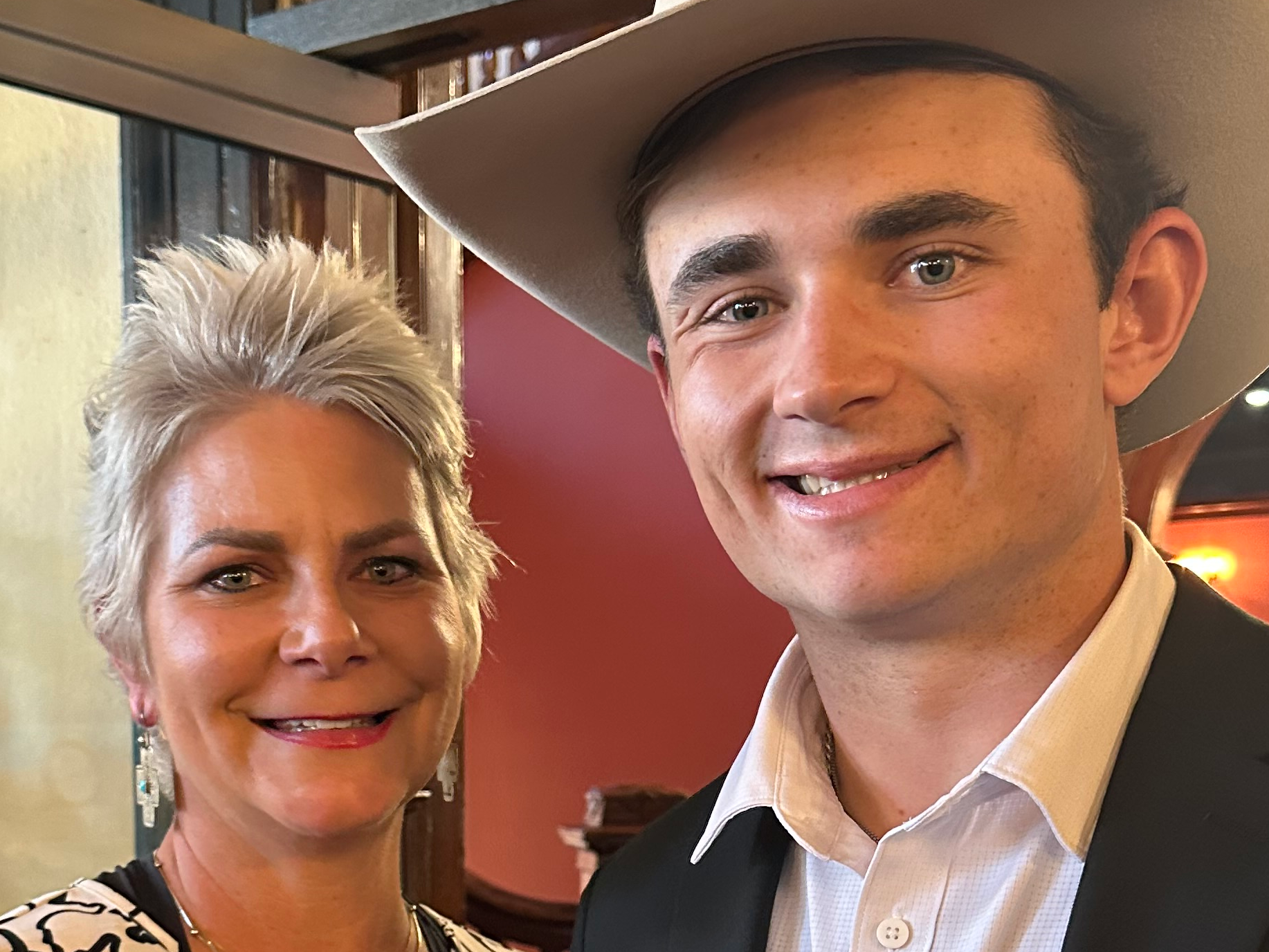 A breast cancer survivor with her son, representing family, hope, and healing after cancer.